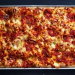 Grandma, thin crust square pie with fresh MOZ