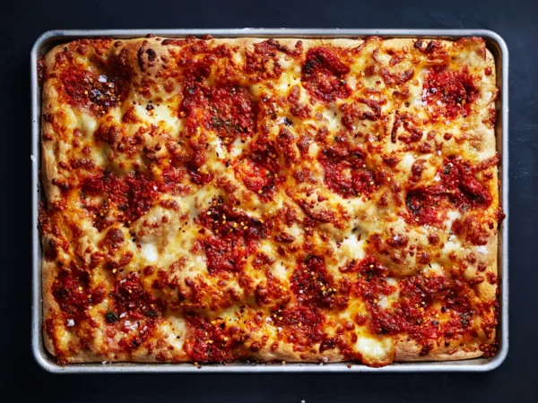 Grandma, thin crust square pie with fresh MOZ